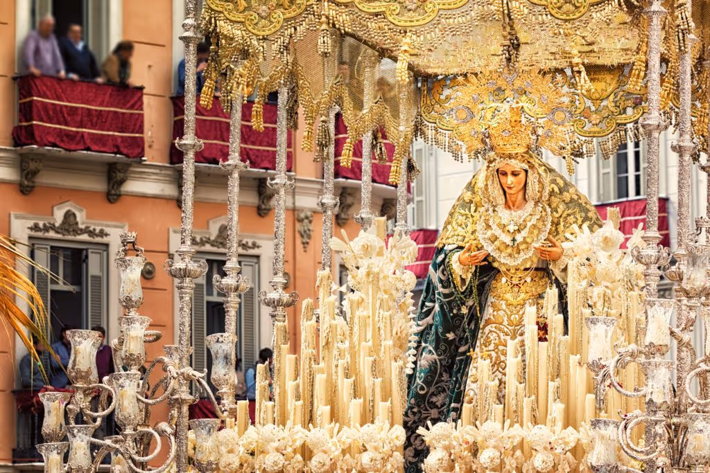Tradition, float and candles during Holy Week in Spain