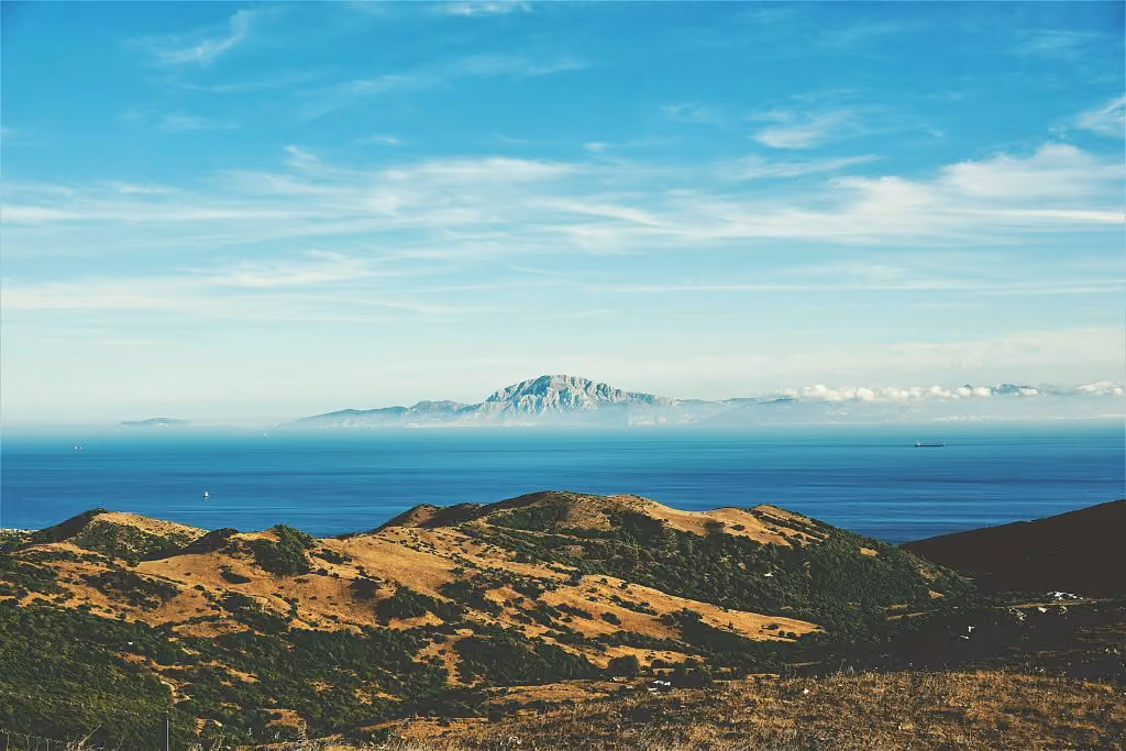 Andalusian landscape with hills and white villages, ideal for buy-to-let investment in Spain in 2025.